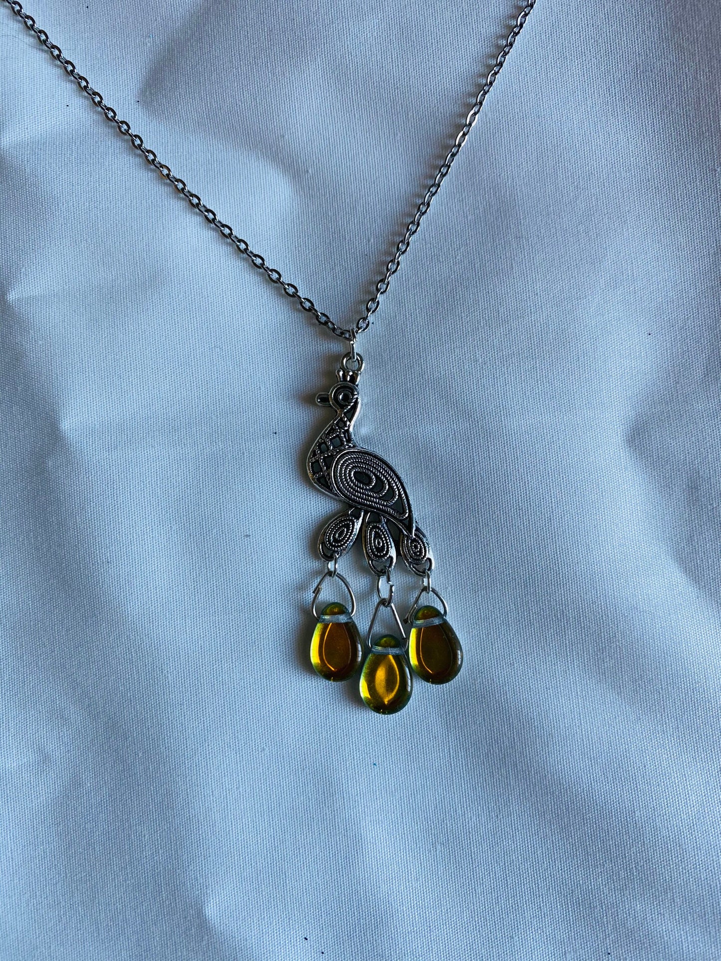 Stunning peacock necklace featuring vintage mirrored czech glass beads