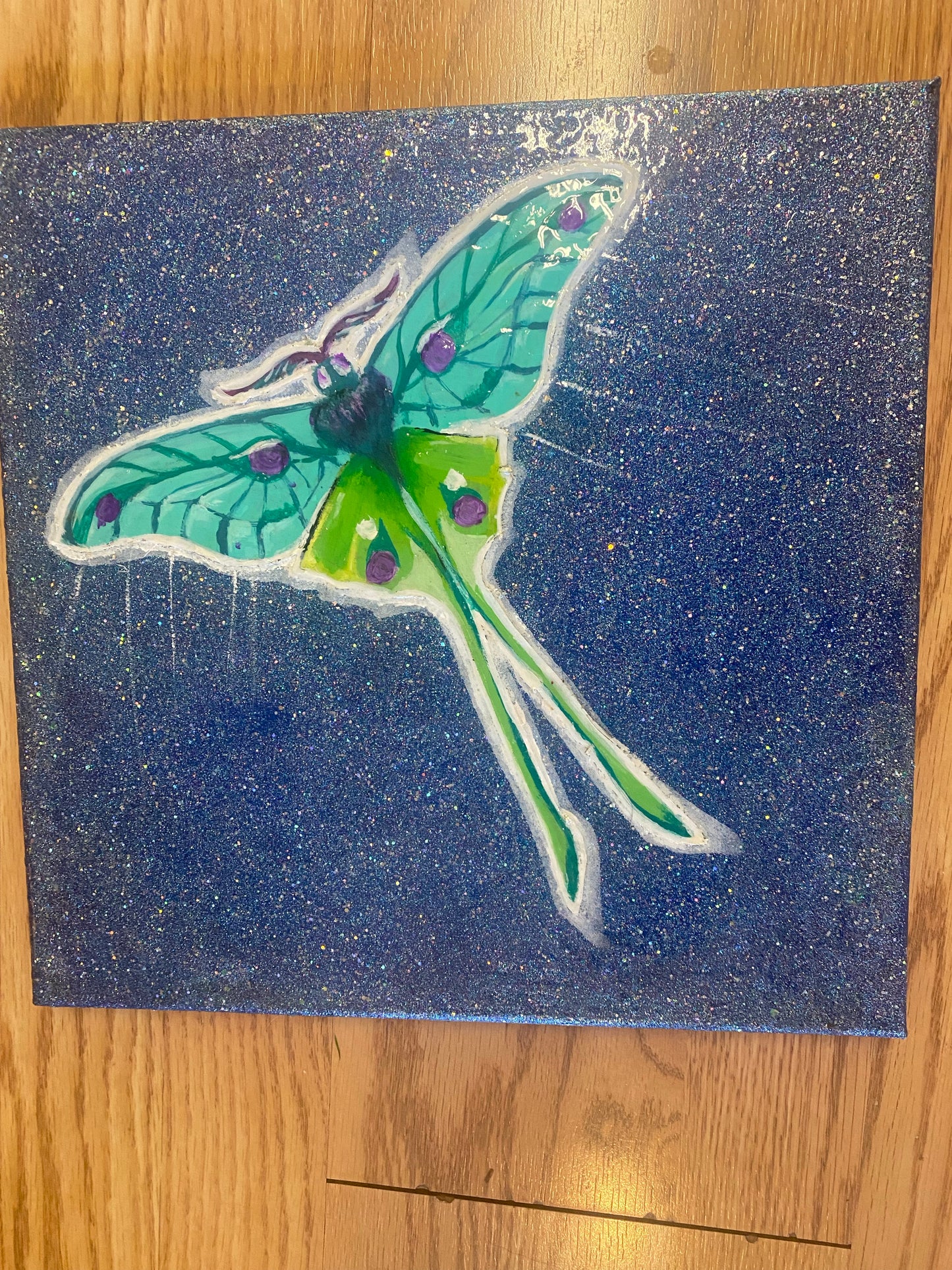 Glittery moth painting