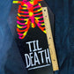 Coffin shaped “til death” art