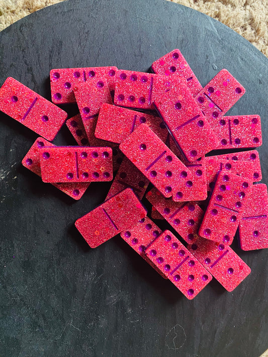 Set of pink and purple glittery dominos